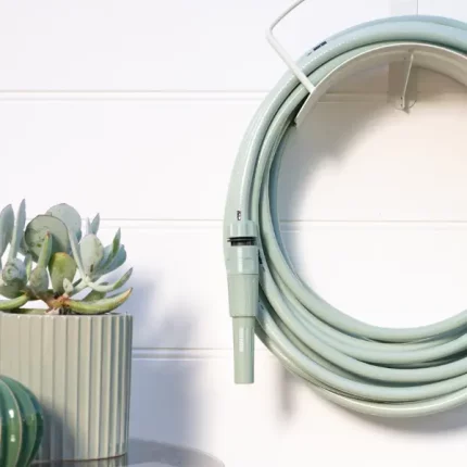 Holman ColourDip™ Green 12mm x 15m garden hose with adjustable nozzle, perfect for versatile garden watering